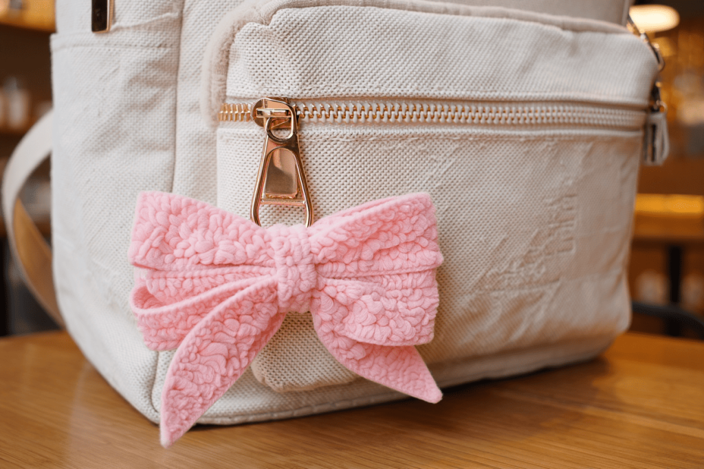 Charm móc khóa nơ treo túi xách, phong cách cute, chất liệu bông mềm